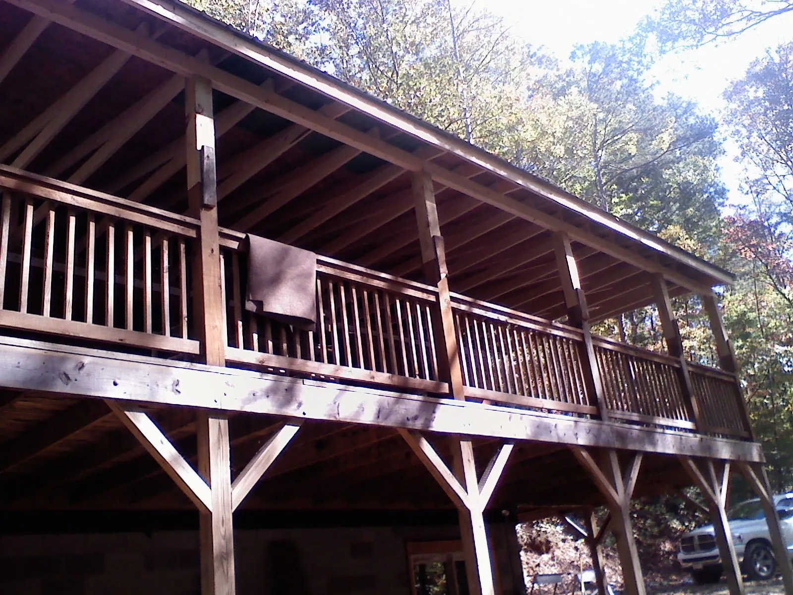 Timber framing under a new elevated porch and deck — Roof Leak Repair in Lynwood by Roofing Brothers